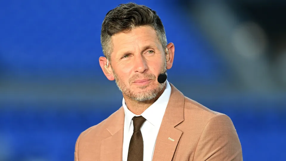 ESPN Broadcaster Dan Orlovsky speaks before the game between the Baltimore Ravens and the Detroit Lions