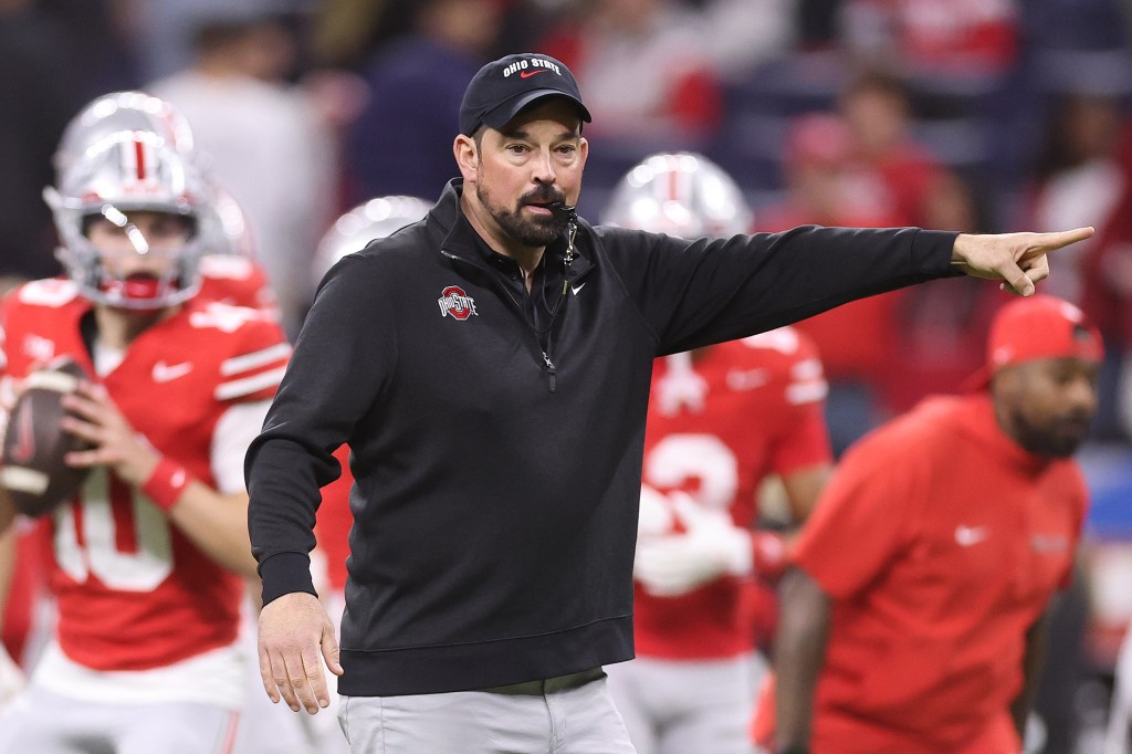 Head coach Ryan Day of the Ohio State Buckeyes looks on during warmups before the 2025 Big Ten Football Championship against the Indiana Hoosiers at Lucas Oil Stadium on December 6, 2025 in Indianapolis, Indiana.   