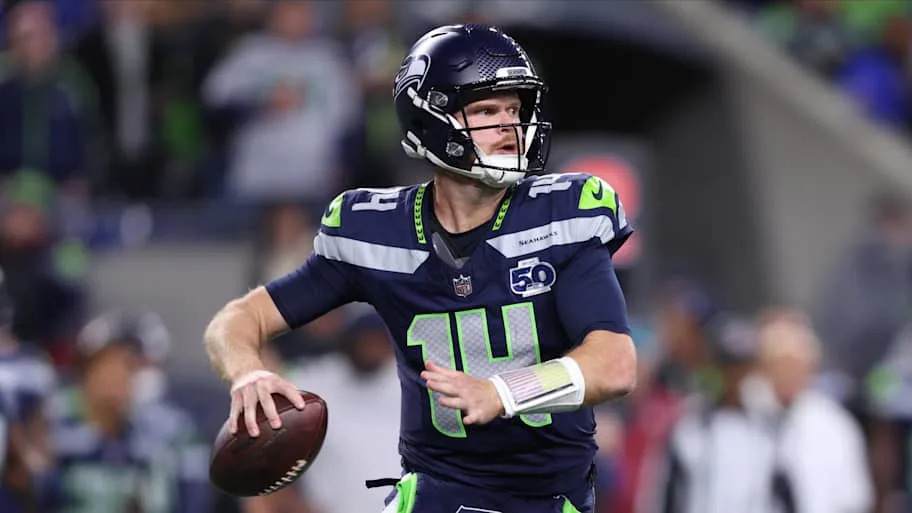 Seattle Seahawks quarterback Sam Darnold looks to throw a pass during the second quarter