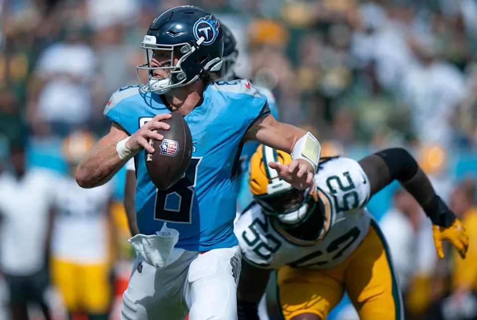 Tennessee Titans quarterback Will Levis (8) is pressured by Green Bay Packers defensive end Rashan Gary (52) during their game at Nissan Stadium in Nashville, Tenn., Sunday, Sept. 22, 2024.