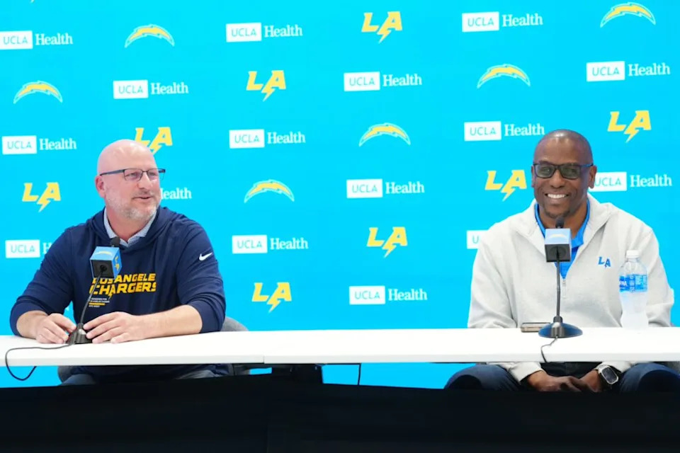 Los Angeles Chargers general manager Joe Hortiz (left) and assistant general manager Chad Alexander speak at press conference at The Bolt. Mandatory Credit: Kirby Lee-Imagn Images