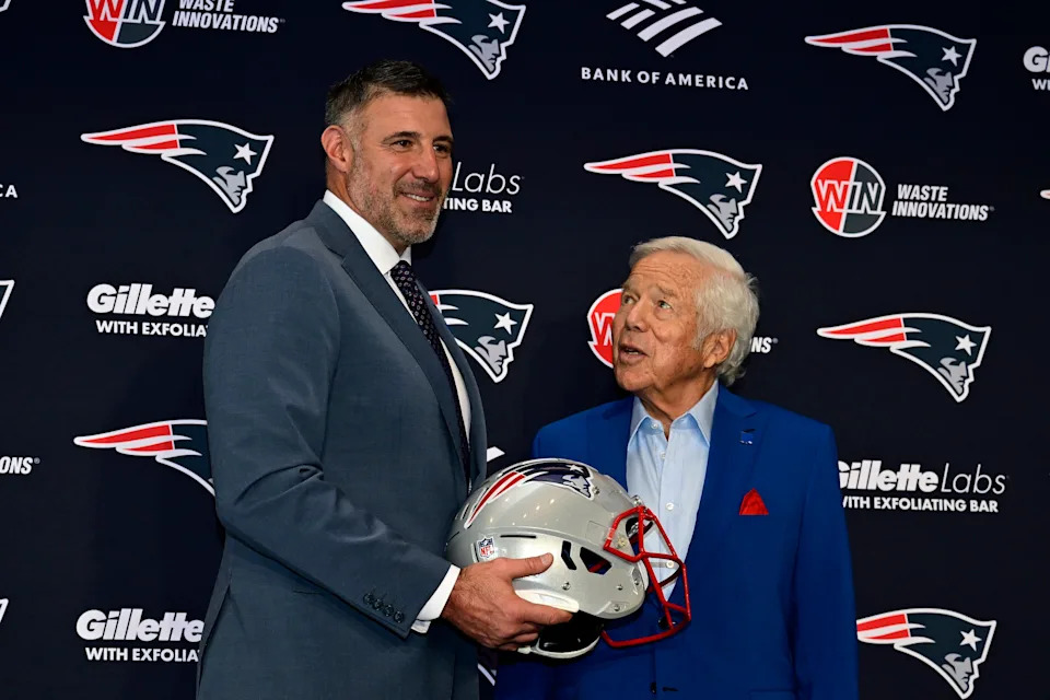 FOXBOROUGH, MASSACHUSETTS - JANUARY 13: Owner Robert Kraft (R) poses for a photograph with Mike Vrabel as Vrabel is announced as head coach of the New England Patriots during a press conference at Gillette Stadium on January 13, 2025 in Foxborough, Massachusetts.  (Photo by Billie Weiss/Getty Images)
