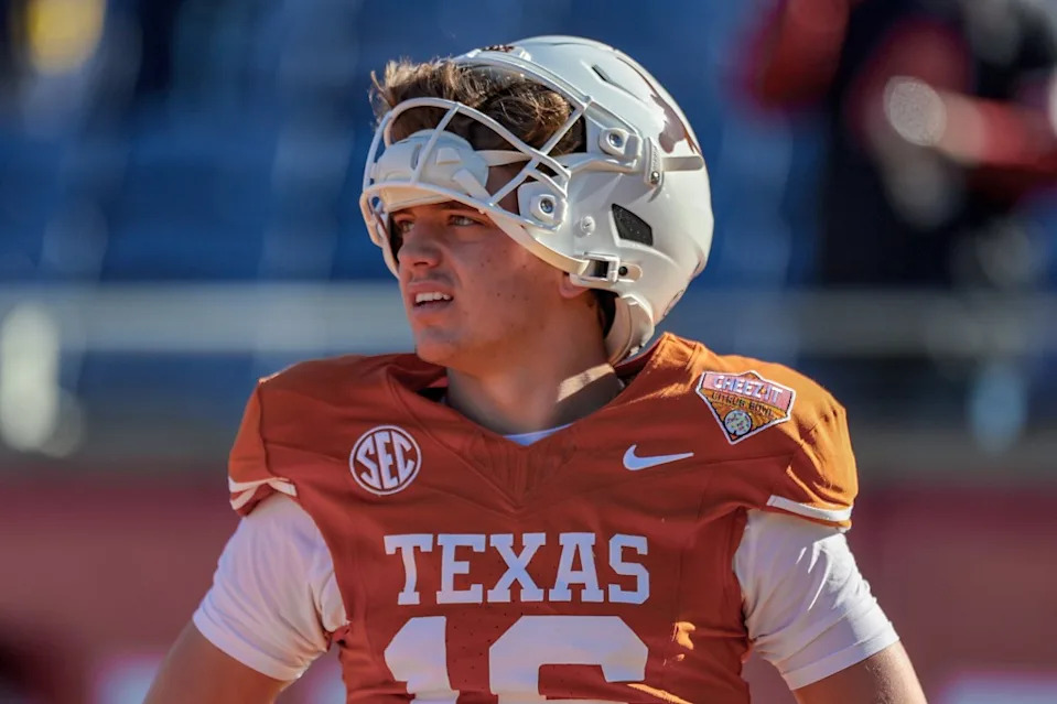 Arch Manning of the Texas Longhorns during warmups before the 2025 Cheez-It Citrus Bowl between the Texas Longhorns and <a class="link " href="https://sports.yahoo.com/ncaaf/teams/michigan/" data-i13n="sec:content-canvas;subsec:anchor_text;elm:context_link" data-ylk="slk:Michigan Wolverines;sec:content-canvas;subsec:anchor_text;elm:context_link;itc:0" data-yga="{"yLinkElement":"context_link","yModuleName":"content-canvas","yLinkText":"Michigan Wolverines","ySubModuleName":"anchor_text","yHasCommerce":false}">Michigan Wolverines</a> at Camping World Stadium on December 31, 2025 in Orlando, Florida. Getty Images