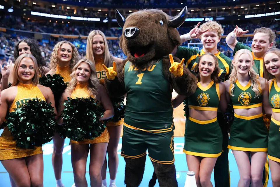Mar 19, 2026; Buffalo, NY, USA; The North Dakota State Bison mascot and cheerleaders pose for a photo before the game against the Michigan State Spartans during a first round game of the men's 2026 NCAA Tournament at Keybank Center. © Gregory Fisher-Imagn Images
