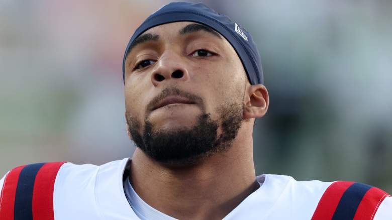New England Patriots running back TreVeyon Henderson looks on during a game amid reactions for using a Bible quote to defend Jaden Ivey