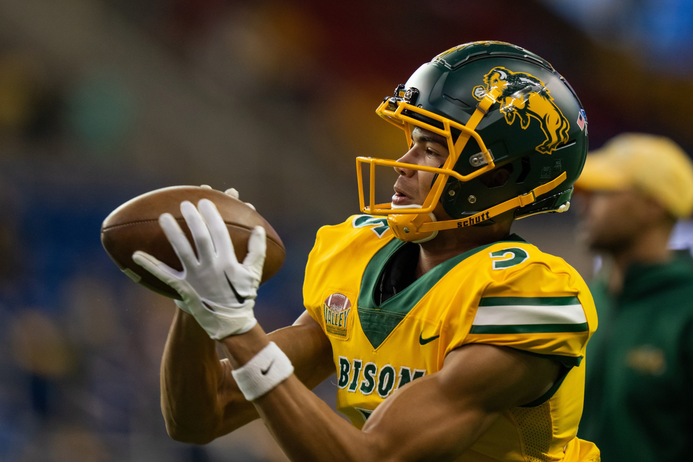 FARGO, NORTH DAKOTA - NOVEMBER 19: Bryce Lance #5 of the North Dakota State Bison catches a pass prior to the game against the North Dakota Fighting Hawks at FARGODOME on November 19, 2022 in Fargo, North Dakota. (Photo by Sean Arbaut/Getty Images)