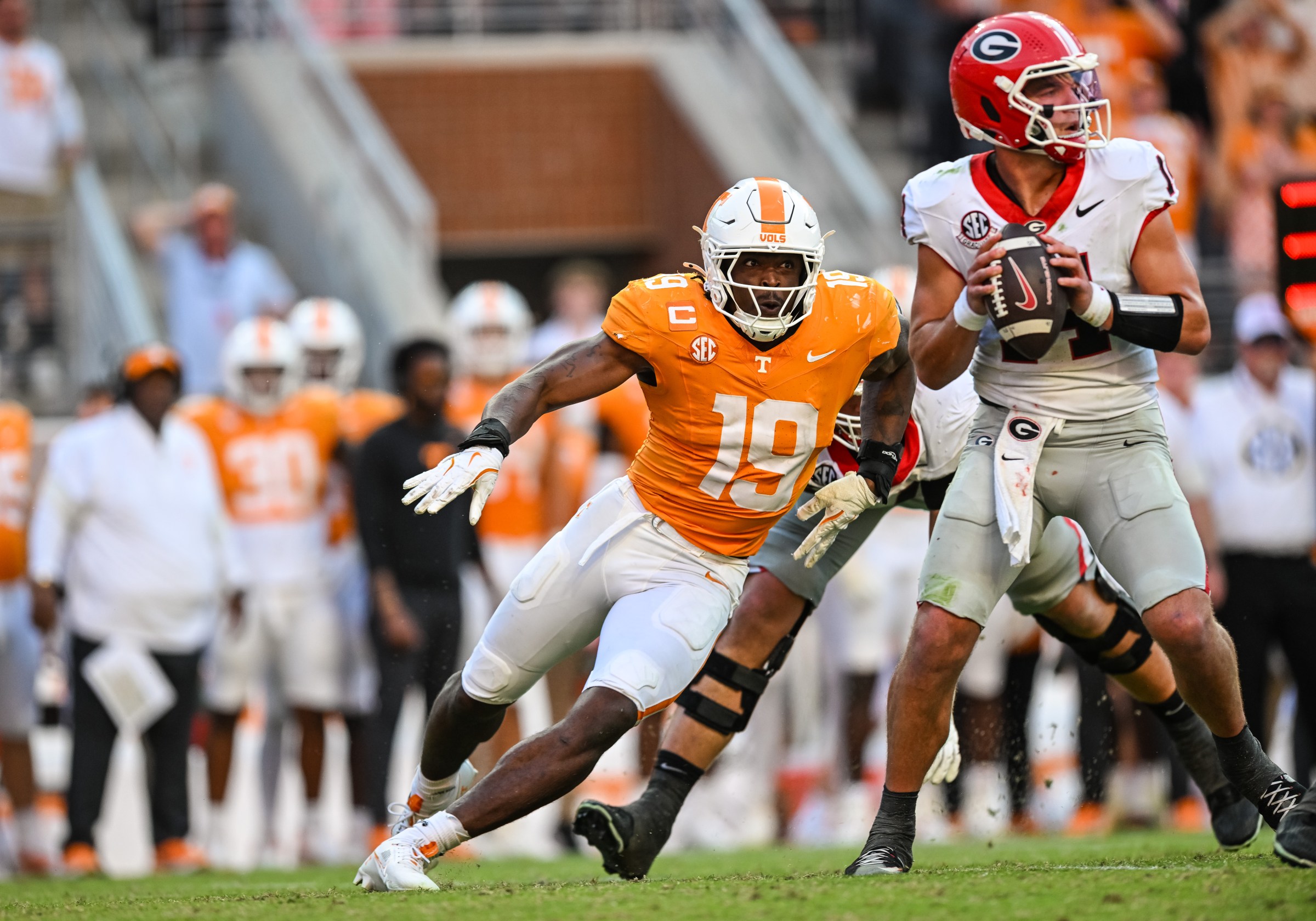 KNOXVILLE, TN - SEPTEMBER 13: Tennessee Volunteers defensive lineman Joshua Josephs (19) rushes at Georgia Bulldogs quarterback Gunner Stockton (14) during the college football game between the Tennessee Volunteers and the Georgia Bulldogs on September 13, 2025, at Neyland Stadium in Knoxville, TN. (Photo by Bryan Lynn/Icon Sportswire via Getty Images)