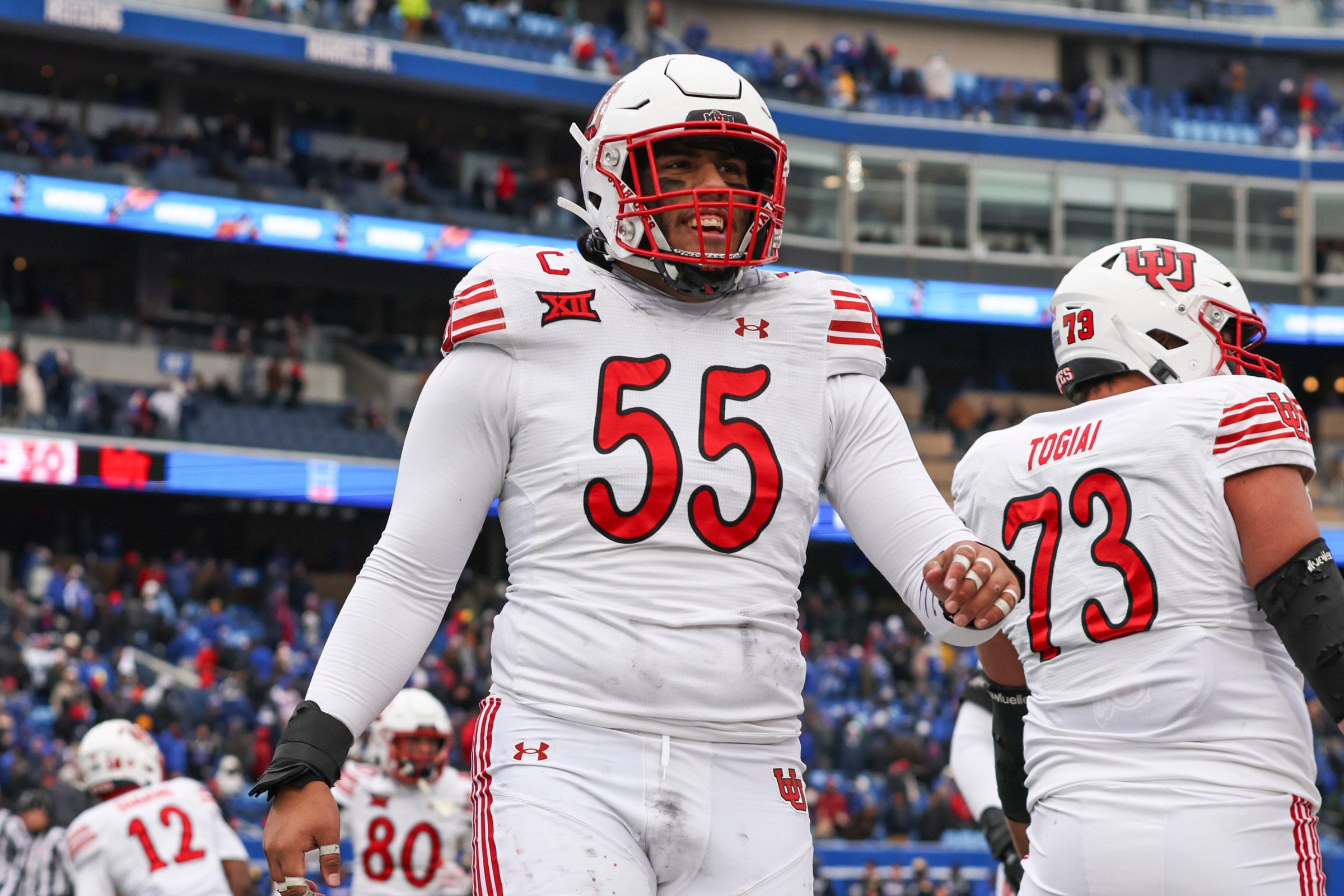 LAWRENCE, KS - NOVEMBER 28: Utah Utes offensive lineman Spencer Fano (55) celebrates a touchdown late in the fourth quarter of a Big 12 football game between the Utah Utes and Kansas Jayhawks on November 28, 2025 at David Booth Kansas Memorial Stadium in Lawrence, KS. (Photo by Scott Winters/Icon Sportswire via Getty Images)