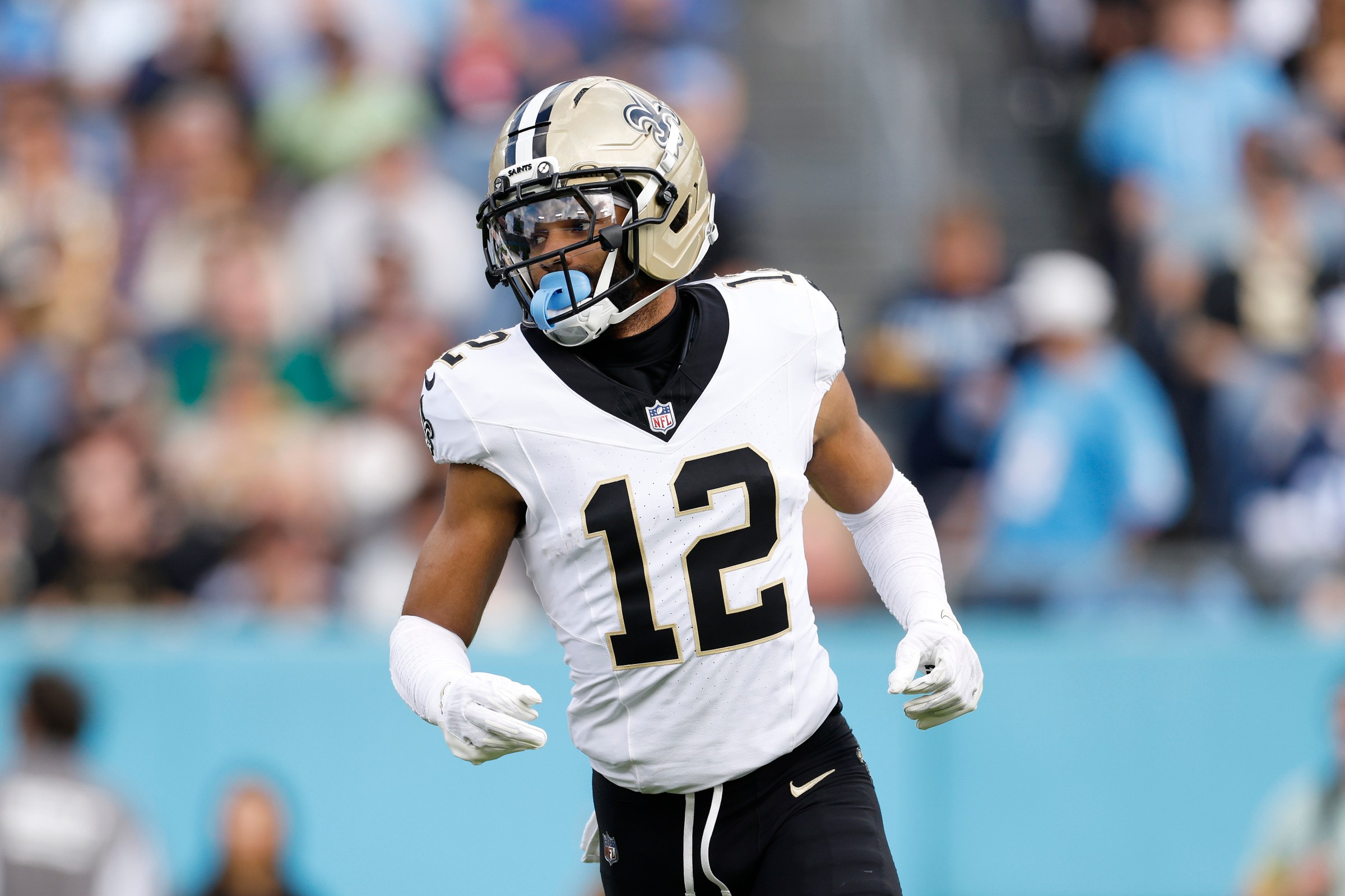 NASHVILLE, TENNESSEE - DECEMBER 28: Chris Olave #12 of the New Orleans Saints looks on during the second half of the NFL 2025 game against the Tennessee Titans at Nissan Stadium on December 28, 2025 in Nashville, Tennessee. (Photo by Johnnie Izquierdo/Getty Images)