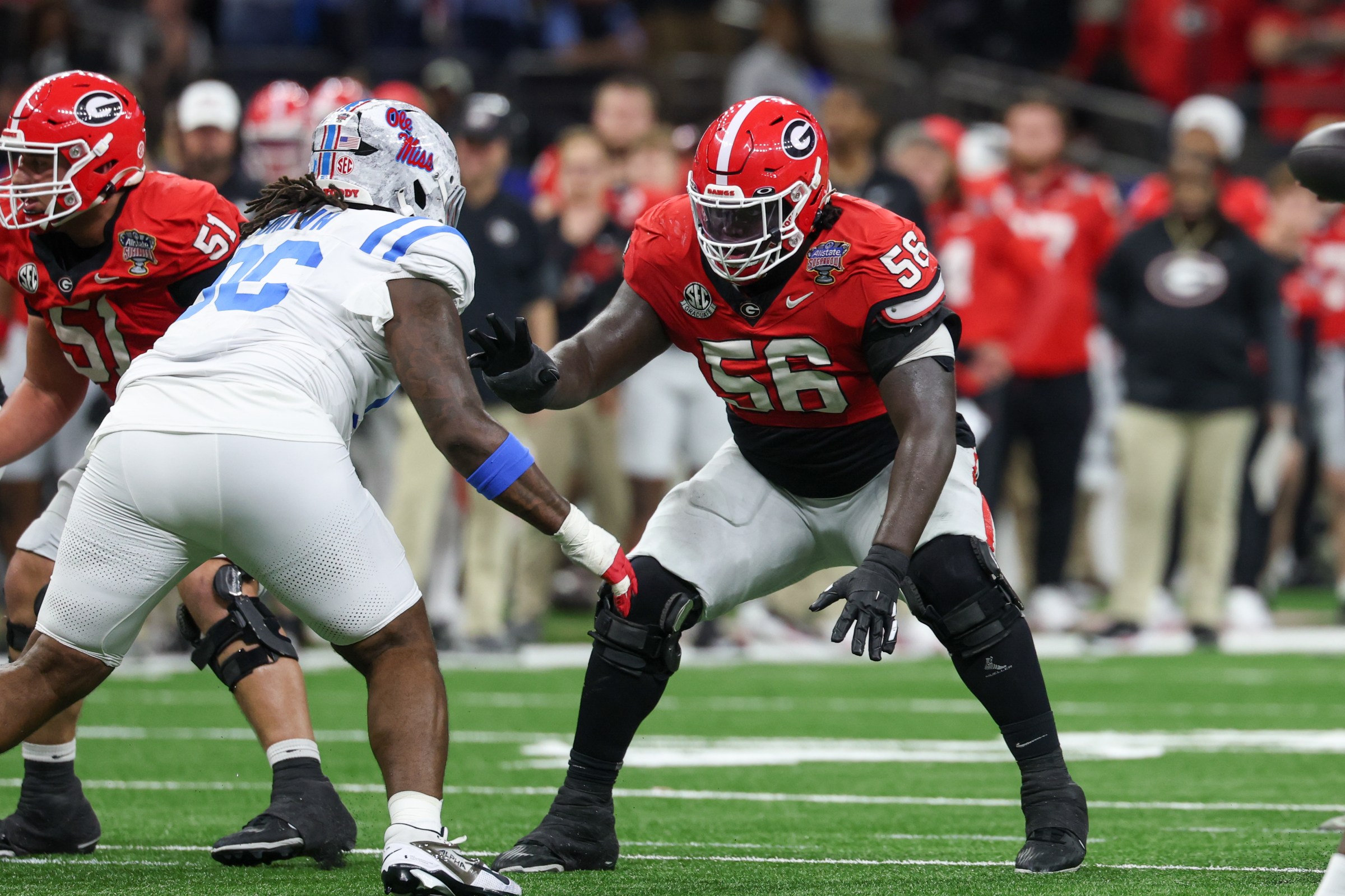 NEW ORLEANS, LA - JANUARY 01: OL Micah Morris #56 of the Georgia Bulldogs readies to block during the College Football Playoff Quarterfinal at the Allstate Sugar Bowl between Ole Miss Rebels and Georgia Bulldogs on January 1, 2026, at Caesars Superdome in New Orleans, LA. (Photo by David Buono/Icon Sportswire via Getty Images)