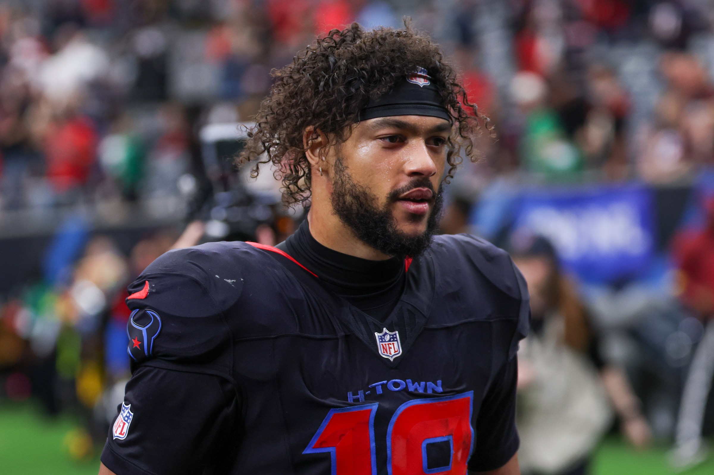 HOUSTON, TX - JANUARY 04: Wide receiver Xavier Hutchinson #19 of the Houston Texans walks off the field after winning the NFL game between Houston Texans and Indianapolis Colts on January 4, 2026, at NRG Stadium in Houston, TX. (Photo by David Buono/Icon Sportswire via Getty Images)