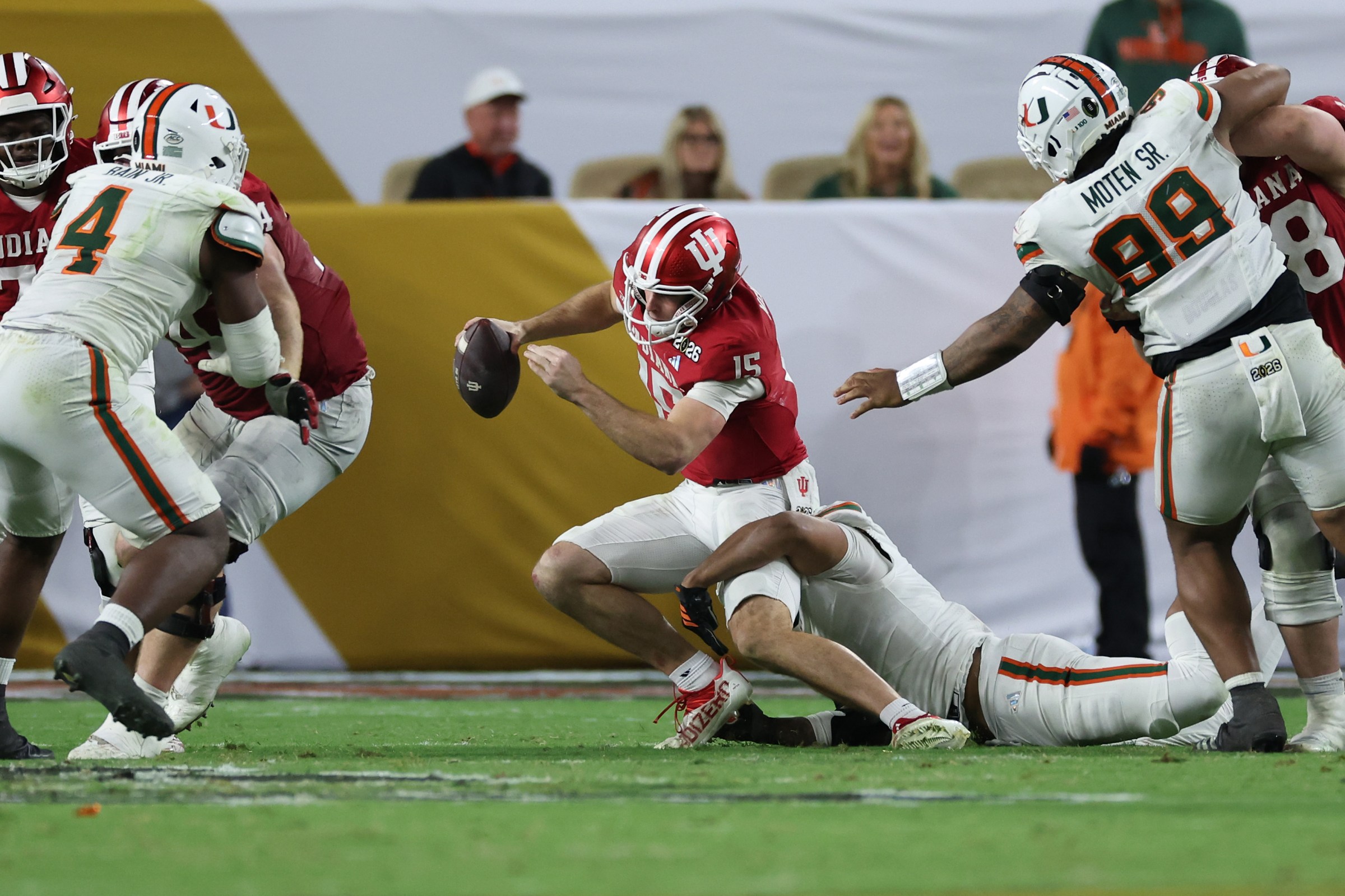 Akheem Mesidor #3 of the Miami Hurricanes sacks Fernando Mendoza