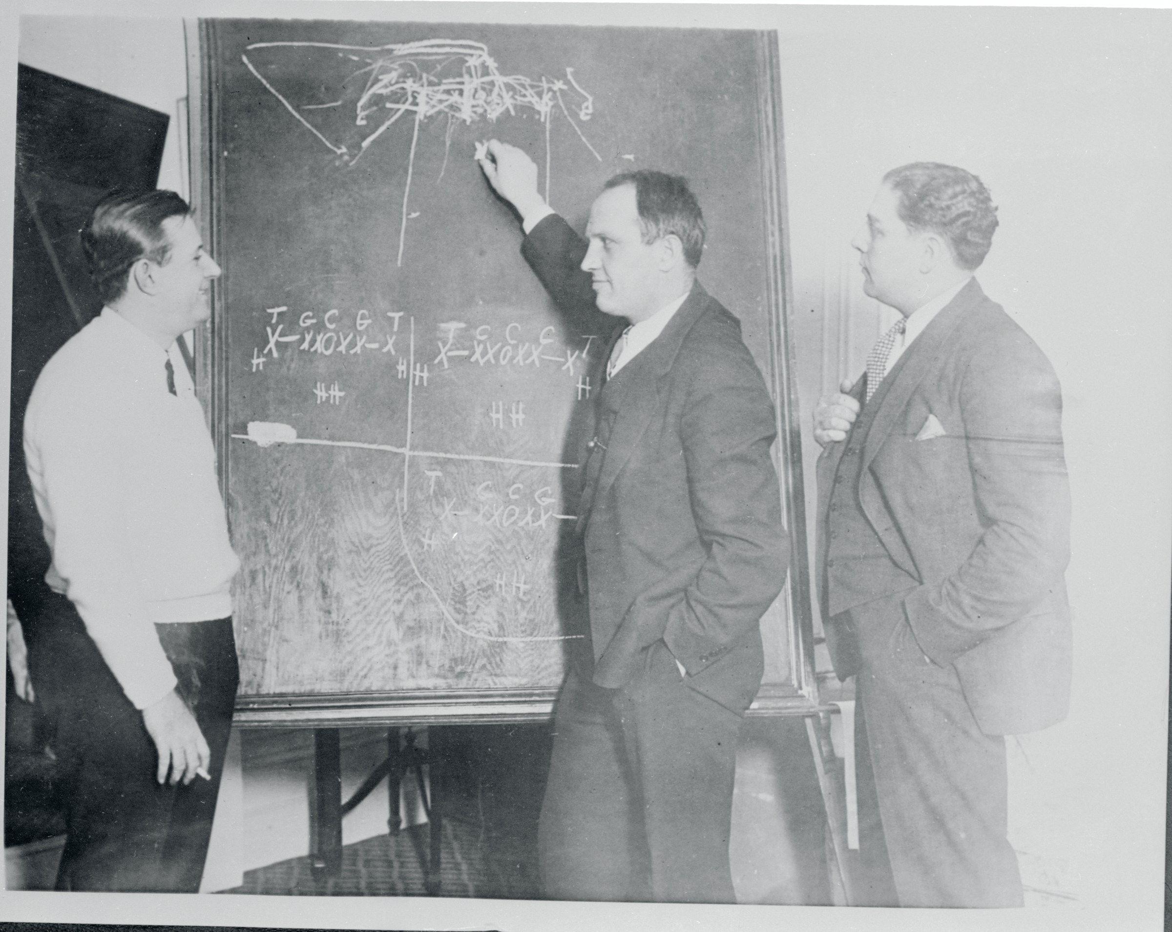 Left to right: Bert Bell, Heinie Miller, and John Da Grossa