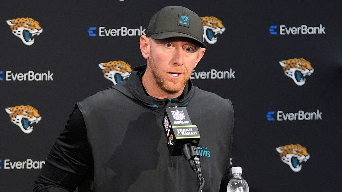 Jacksonville Jaguars head coach Liam Coen talking to reporters