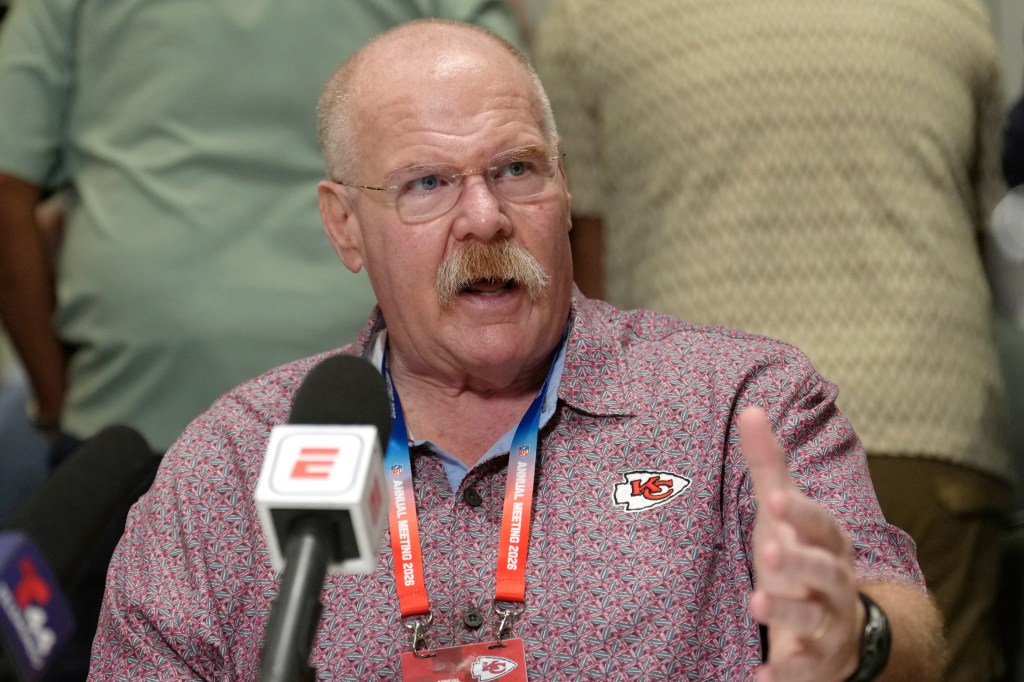 Andy Reid speaking at the NFL annual meetings.