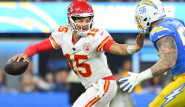 Patrick Mahomes avoids a Chargers defender as he scrambles from the pocket