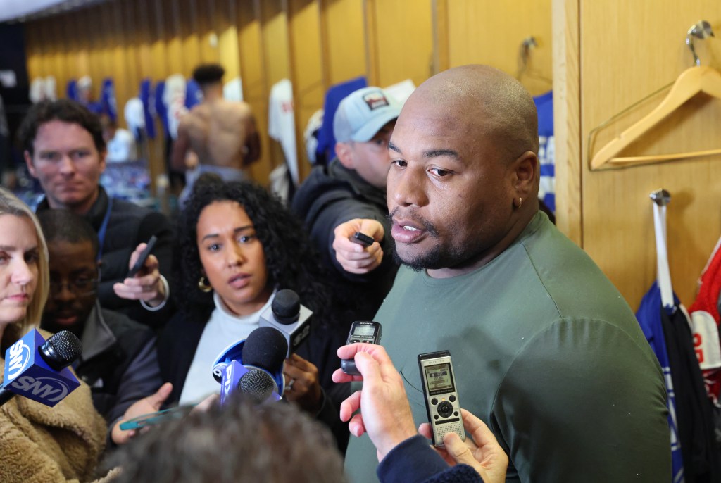 New York Giants defensive tackle Dexter Lawrence II #97, speaking to the media in front of his locker after practice at the New York Giants training facility in East Rutherford, New Jersey
