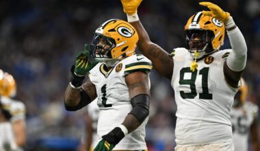Nov 27, 2025; Detroit, Michigan, USA; Green Bay Packers defensive end Micah Parsons (1) and Green Bay Packers defensive tackle Warren Brinson (91) celebrate after a play against the Detroit Lions during the first quarter at Ford Field. Mandatory Credit: Lon Horwedel-Imagn Images