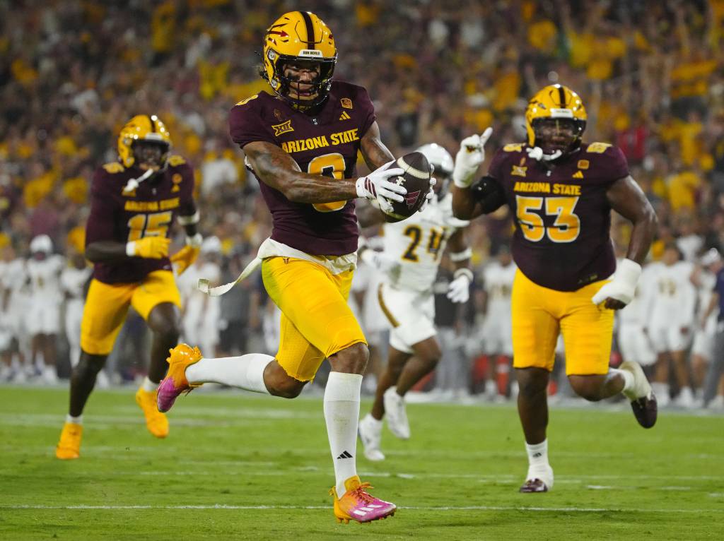 Arizona State wide receiver Jordyn Tyson scores a touchdown.