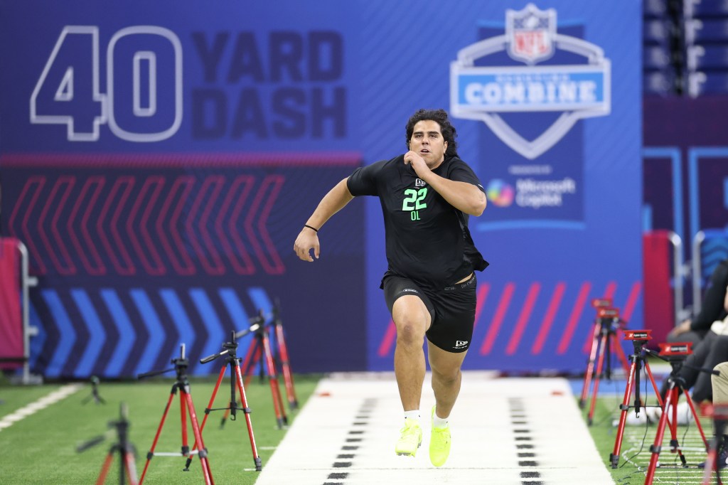 Spencer Fano of the Utah Utes participating in the 40-yard dash during the NFL Scouting Combine.