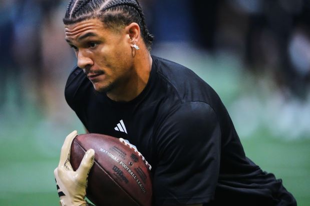 Washington wide receiver Denzel Boston runs the ball during drills during Washington's NFL football Pro Day Monday, March 16, 2026, in Seattle. (AP Photo/Lindsey Wasson)