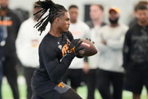 Tennessee defensive back Jermod McCoy runs a drill during the school's NFL football pro day Tuesday, March 31, 2026, in Knoxville, Tenn. (AP Photo/George Walker IV)