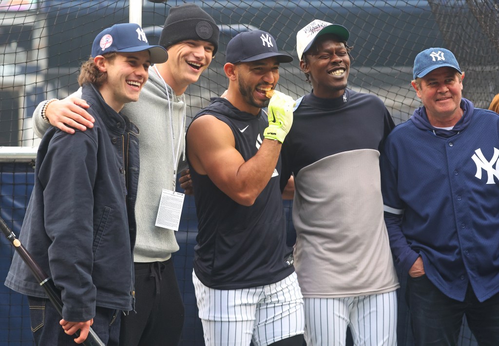 J.J. McCarthy (second from left) with Jack Hughes (far left) during the Yankees' home opener on April 3, 2026.