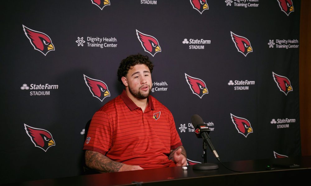 Cardinals rookie lineman from Texas A&M, Chase Bisontis, speaks to the media at the Arizona Cardinals training center on May 11, 2026, in Tempe.