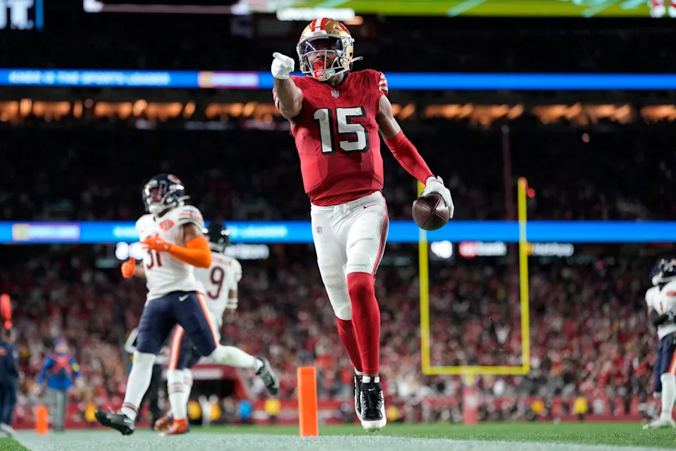 Dec 28, 2025; Santa Clara, California, USA; San Francisco 49ers wide receiver Jauan Jennings (15) runs to score a touchdown against the Chicago Bears in the second half at Levi's Stadium.