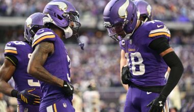 Nov 16, 2025; Minneapolis, Minnesota, USA; Minnesota Vikings wide receiver Jordan Addison (3) and wide receiver Justin Jefferson (18) celebrate a touchdown during the fourth quarter against the Chicago Bears at U.S. Bank Stadium.