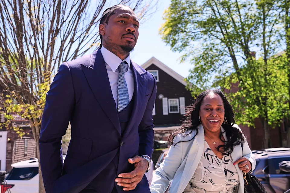 Former New England Patriots wide receiver Stefon Diggs returns to Norfolk County District Court, Monday, May 4, 2026, in Dedham, Mass. (AP Photo/Charles Krupa)