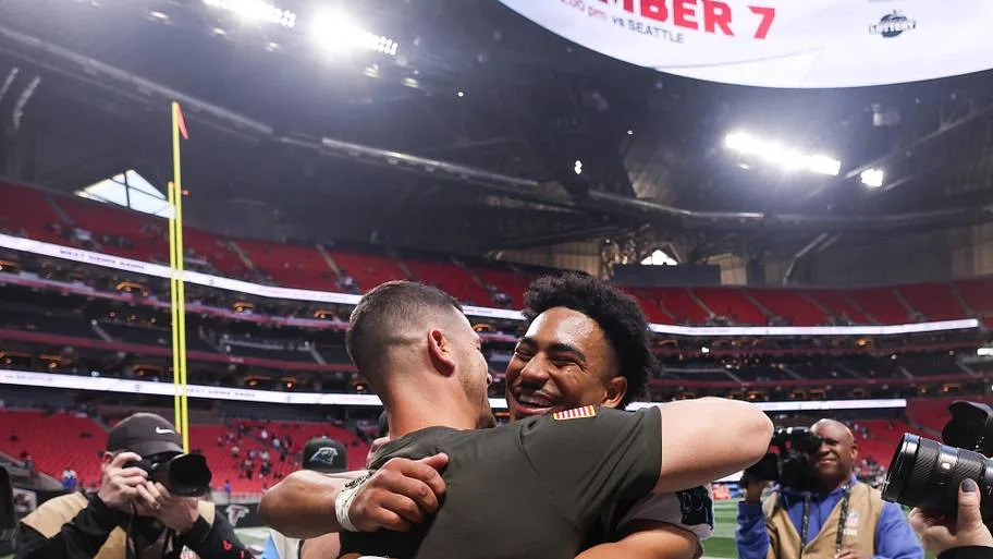 Bryce Young and Dave Canales after defeating the Falcon