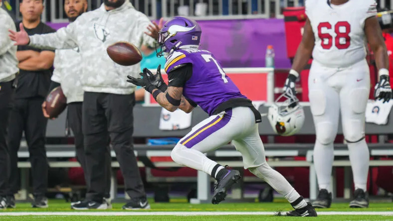 Byron Murphy Jr. intercepts a pass against the Cardinals during a game at U.S. Bank Stadium in Minneapolis.