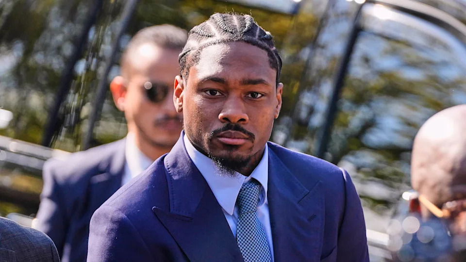Former New England Patriots wide receiver Stefon Diggs arrives at Norfolk County District Court, Monday, May 4, 2026, in Dedham, Mass. (AP Photo/Charles Krupa)