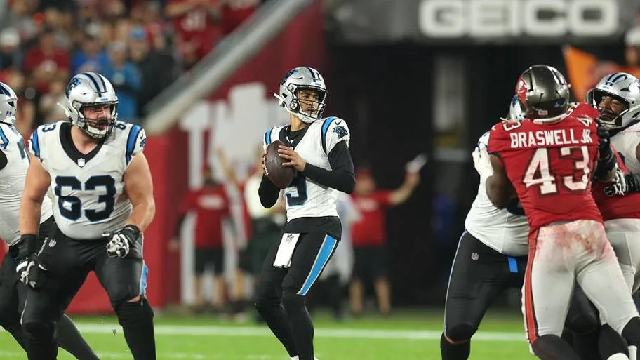 Carolina Panthers quarterback Bryce Young (9) looks to pass against the Tampa Bay Buccaneers 