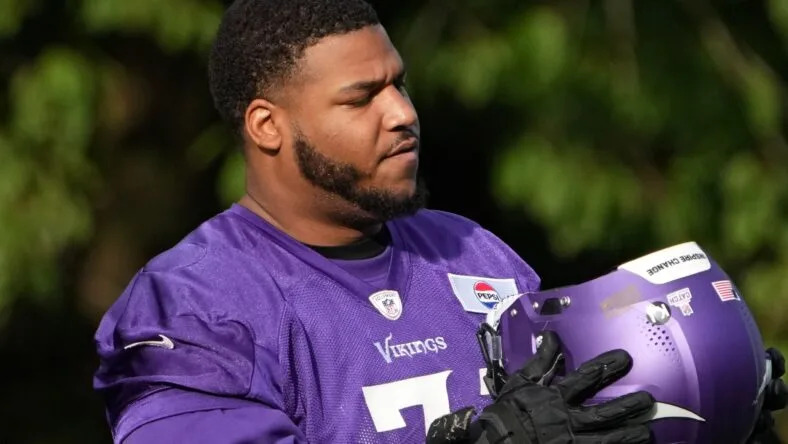 Christian Darrisaw participates in a Vikings practice session at The Grove in Watford, United Kingdom. best Vikings players