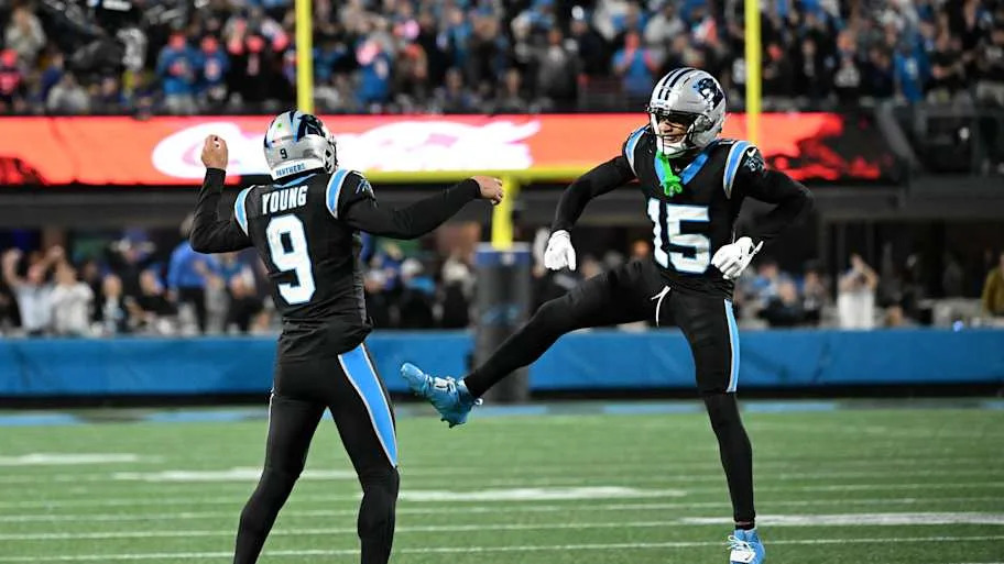Carolina Panthers quarterback Bryce Young (9) and wide receiver Jimmy Horn Jr. (15) react 