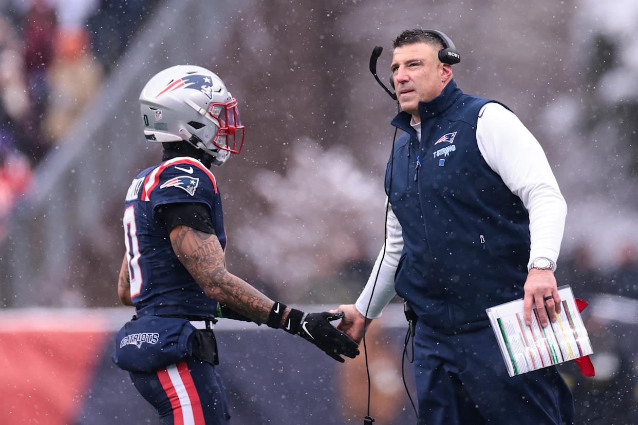 “We aren’t going to speak on what we talked about inside the building, but I mean, that’s my coach,” Gonzalez (seen here with Vrabel) said. Getty Images