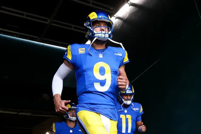 Sep 21, 2025; Philadelphia, Pennsylvania, USA; Los Angeles Rams quarterback Matthew Stafford (9) runs out of the tunnel for a game against the Philadelphia Eagles at Lincoln Financial Field. Mandatory Credit: Bill Streicher-Imagn Images