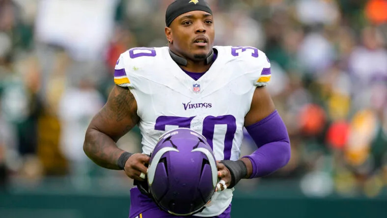 Nov 23, 2025; Green Bay, Wisconsin, USA; Minnesota Vikings fullback C.J. Ham (30) during the game against the <a class="link " href="https://sports.yahoo.com/nfl/teams/green-bay/" data-i13n="sec:content-canvas;subsec:anchor_text;elm:context_link" data-ylk="slk:Green Bay Packers;sec:content-canvas;subsec:anchor_text;elm:context_link;itc:0" data-yga="{"yLinkElement":"context_link","yModuleName":"content-canvas","yLinkText":"Green Bay Packers","ySubModuleName":"anchor_text","yHasCommerce":false}">Green Bay Packers</a> at Lambeau Field. Mandatory Credit: Jeff Hanisch-Imagn Images