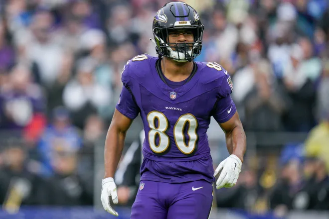 Dec 10, 2023; Baltimore, Maryland, USA; Baltimore Ravens tight end Isaiah Likely (80) celebrates his touchdown against the Los Angeles Rams during the first quarter at M&T Bank Stadium. Mandatory Credit: Jessica Rapfogel-USA TODAY Sports