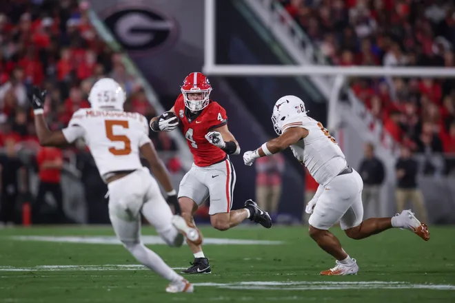 Nov 15, 2025; Athens, Georgia, USA; Georgia Bulldogs tight end Oscar Delp (4) runs the ball in the first half agains the Texas Longhorns at Sanford Stadium. Mandatory Credit: Brett Davis-Imagn Images