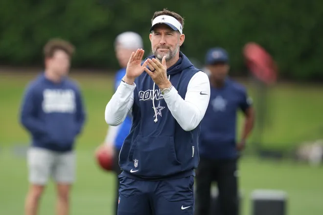 May 1, 2026; Frisco, TX, USA; Dallas Cowboys head coach Brian Schottenheimer on the field during practice at the Ford Center at the Star Training Facility in Frisco, Texas. Mandatory Credit: Chris Jones-Imagn Images