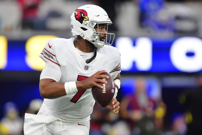 Jan 4, 2026; Inglewood, California, USA; Arizona Cardinals quarterback Jacoby Brissett (7) rolls out against the Los Angeles Rams during the second half at SoFi Stadium. Mandatory Credit: Gary A. Vasquez-Imagn Images