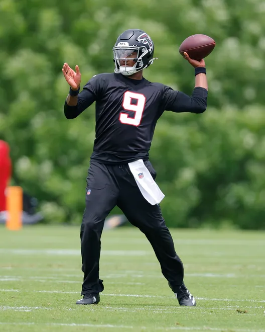 FLOWERY BRANCH, GEORGIA - MAY 27: Michael Penix Jr. #9 of the Atlanta Falcons runs through drills during OTA's at IBM Performance Field on May 27, 2026 in Flowery Branch, Georgia. (Photo by Todd Kirkland/Getty Images)
