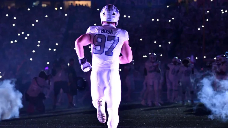 Oct 5, 2025; Orchard Park, New York, USA; <a class="link " href="https://sports.yahoo.com/nfl/teams/buffalo/" data-i13n="sec:content-canvas;subsec:anchor_text;elm:context_link" data-ylk="slk:Buffalo Bills;sec:content-canvas;subsec:anchor_text;elm:context_link;itc:0" data-yga="{"yLinkElement":"context_link","yModuleName":"content-canvas","yLinkText":"Buffalo Bills","ySubModuleName":"anchor_text","yHasCommerce":false}">Buffalo Bills</a> defensive end <a class="link " href="https://sports.yahoo.com/nfl/players/29237/" data-i13n="sec:content-canvas;subsec:anchor_text;elm:context_link" data-ylk="slk:Joey Bosa;sec:content-canvas;subsec:anchor_text;elm:context_link;itc:0" data-yga="{"yLinkElement":"context_link","yModuleName":"content-canvas","yLinkText":"Joey Bosa","ySubModuleName":"anchor_text","yHasCommerce":false}">Joey Bosa</a> (97) takes the field before the game against the <a class="link " href="https://sports.yahoo.com/nfl/teams/new-england/" data-i13n="sec:content-canvas;subsec:anchor_text;elm:context_link" data-ylk="slk:New England Patriots;sec:content-canvas;subsec:anchor_text;elm:context_link;itc:0" data-yga="{"yLinkElement":"context_link","yModuleName":"content-canvas","yLinkText":"New England Patriots","ySubModuleName":"anchor_text","yHasCommerce":false}">New England Patriots</a> at Highmark Stadium. Mandatory Credit: Mark Konezny-Imagn Images