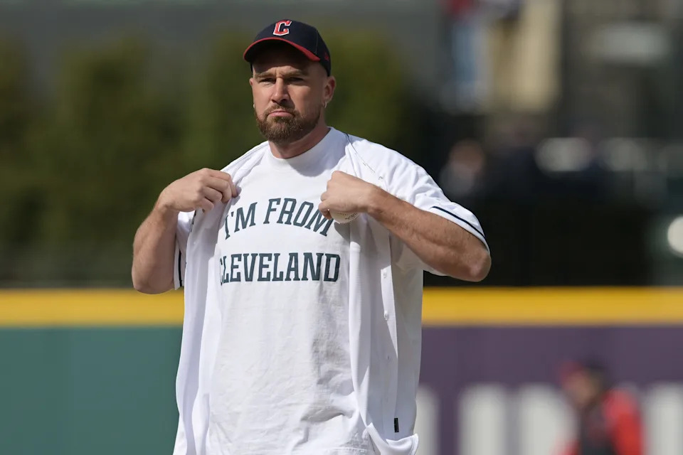 Travis Kelce prepares to throw out the first pitch before the Apr 7, 2023, game between the Cleveland Guardians and the Seattle Mariners at Progressive Field.