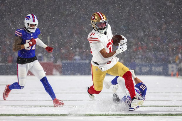 Isaac Guerendo #31 of the San Francisco 49ers runs the ball for a touchdown against the Buffalo Bills at Highmark Stadium on Dec. 01, 2024 in Orchard Park, New York. (Photo by Timothy T Ludwig/Getty Images)