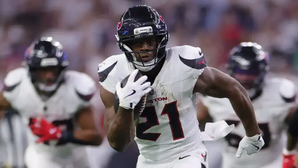 Nick Chubb carries the football for Houston while Cowboys fans consider the risk of adding another veteran running back
