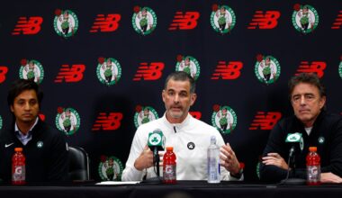 Aditya Mittal (left) and Wyc Grousbeck (right) flanked Bill Chisholm at a press conference following the sale of the Celtics.
